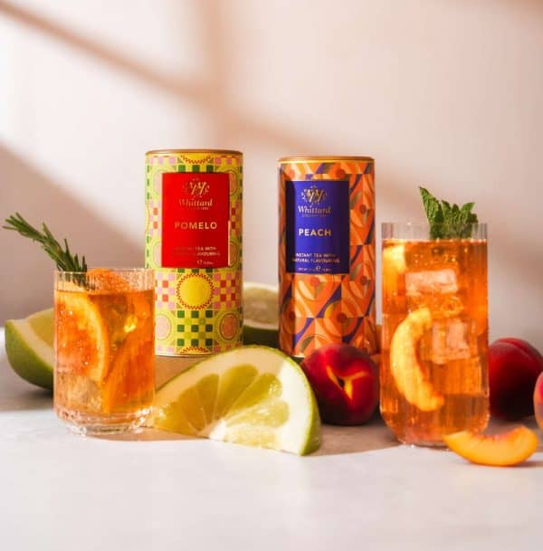 Whittard Pomelo and Peach iced-tea drinks, next to fresh fruit and tins of instant tea